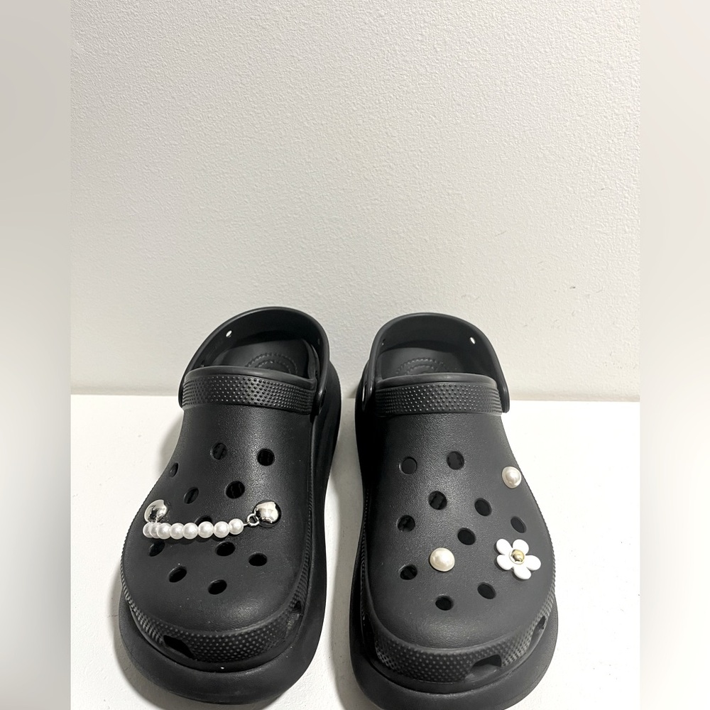 platform Crocs with floral and pearl charms size 9